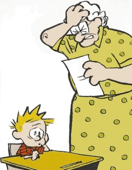 In a panel from classic comic "Calvin and Hobbes," Calvin's teacher, Miss Wormwood, grimaces and slaps her forehead while holding a paper and standing over Calvin at his desk. Calvin is a white boy in a red and black striped shirt and with blonde spiky hair. Miss Wormwood is an older white woman with white hair, square glasses, and a green dress with green polka dots.